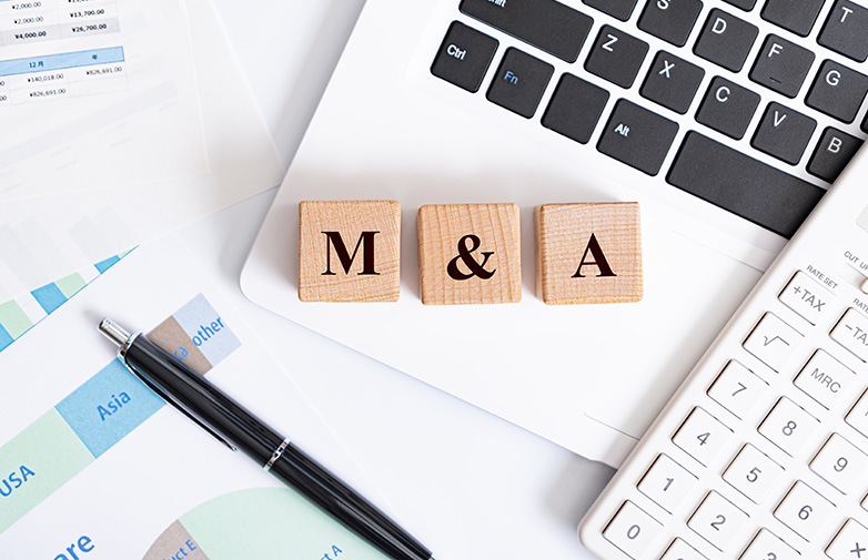 M&A word made with building blocks