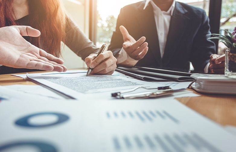 Business Signing a Contract Buy - sell house.