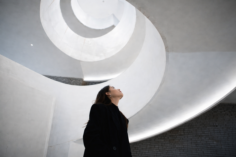 A Beautiful Woman Is Walking And Shopping On The Spiral Staircase Stock Photo Symbolising Elevating Business
